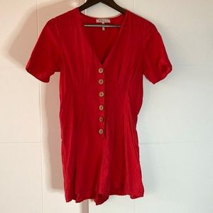 Red buttoned linen romper from BCBGeneration